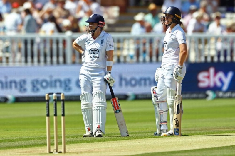 England's Heather Knight looks on with Nat Sciver-Brunt on the second day of Women's Test Match against India at Lord's Cricket Ground, London, Britain, on July 11, 2026. (Reuters) England's Heather Knight looks on with Nat Sciver-Brunt on the second day of Women's Test Match against India at Lord's Cricket Ground, London, Britain, on July 11, 2026. (Reuters)