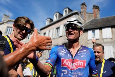 Alpecin - Premier Tech's Mathieu Van Der Poel celebrates winning stage 9 at the Tour de France from Malemort to Ussel in Ussel, France, on July 12, 2026. (Reuters) Alpecin - Premier Tech's Mathieu Van Der Poel celebrates winning stage 9 at the Tour de France from Malemort to Ussel in Ussel, France, on July 12, 2026. (Reuters)