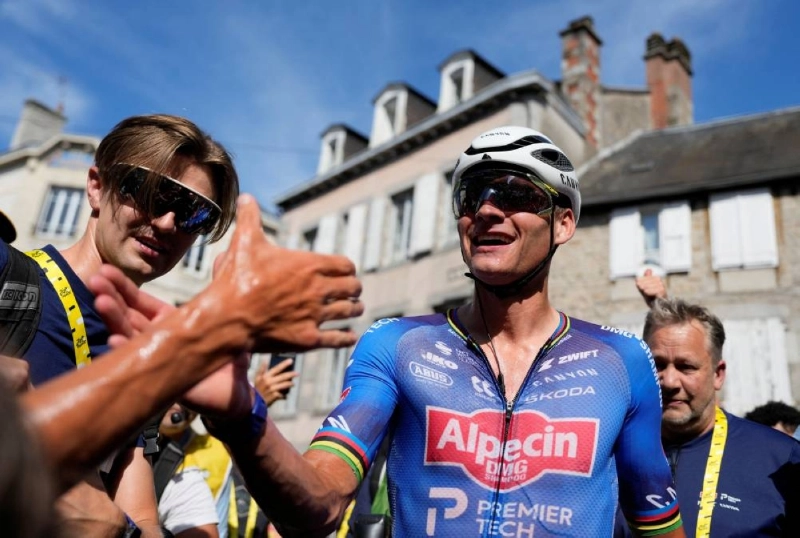 Alpecin - Premier Tech's Mathieu Van Der Poel celebrates winning stage 9 at the Tour de France from Malemort to Ussel in Ussel, France, on July 12, 2026. (Reuters) Alpecin - Premier Tech's Mathieu Van Der Poel celebrates winning stage 9 at the Tour de France from Malemort to Ussel in Ussel, France, on July 12, 2026. (Reuters)