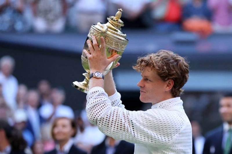 Italy's Jannik Sinner poses with the Gentleman's Singles trophy after his victory against Germany's Alexander Zverev at the end of their s singles final on the last day of the 2026 Wimbledon Championships at The All England Lawn Tennis and Croquet Club in Wimbledon, southwest London, on July 12, 2026. (AFP) Italy's Jannik Sinner poses with the Gentleman's Singles trophy after his victory against Germany's Alexander Zverev at the end of their s singles final on the last day of the 2026 Wimbledon Championships at The All England Lawn Tennis and Croquet Club in Wimbledon, southwest London, on July 12, 2026. (AFP)