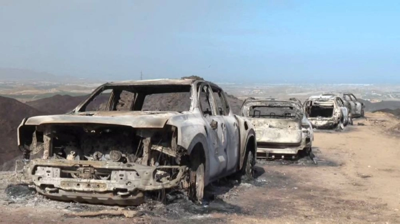 A screengrab from video shows the remains of burned-out cars used by people who died while trying to escape deadly wildfires affecting Almeria province, according to Spain's Guardia Civil, in Bedar, Almeria, Spain, July 10, 2026. REUTERS A screengrab from video shows the remains of burned-out cars used by people who died while trying to escape deadly wildfires affecting Almeria province, according to Spain's Guardia Civil, in Bedar, Almeria, Spain, July 10, 2026. REUTERS