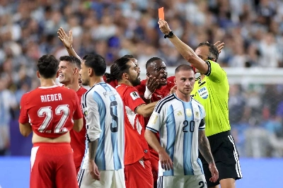 Referee Joao Pinheiro shows a red card to Breel Embolo of Switzerland during the FIFA World Cup quarter-final against Argentina at Kansas City Stadium on July 11, 2026 in Kansas City, Missouri. (AFP) Referee Joao Pinheiro shows a red card to Breel Embolo of Switzerland during the FIFA World Cup quarter-final against Argentina at Kansas City Stadium on July 11, 2026 in Kansas City, Missouri. (AFP)