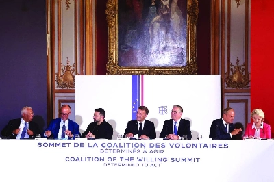 From left: European Council President Antonio Costa, German Chancellor Friedrich Merz, Ukrainian President Volodymyr Zelensky, French President Emmanuel Macron, British PM Keir Starmer, Polish PM Donald Tusk, and European Commission President Ursula von der Leyen attend take part in a summit of the Coalition of the Willing to support Ukraine at the Hotel des Invalides in Paris Monday. (AFP) From left: European Council President Antonio Costa, German Chancellor Friedrich Merz, Ukrainian President Volodymyr Zelensky, French President Emmanuel Macron, British PM Keir Starmer, Polish PM Donald Tusk, and European Commission President Ursula von der Leyen attend take part in a summit of the Coalition of the Willing to support Ukraine at the Hotel des Invalides in Paris Monday. (AFP)
