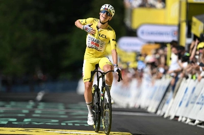 UAE Team Emirates - XRG's Slovenian rider Tadej Pogacar cycles to the finish line to win the 10th stage of the 113th edition of the Tour de France, 166,6 km between Aurillac and Le Lioran in the Massif Central, on July 14, 2026. (AFP) UAE Team Emirates - XRG's Slovenian rider Tadej Pogacar cycles to the finish line to win the 10th stage of the 113th edition of the Tour de France, 166,6 km between Aurillac and Le Lioran in the Massif Central, on July 14, 2026. (AFP)