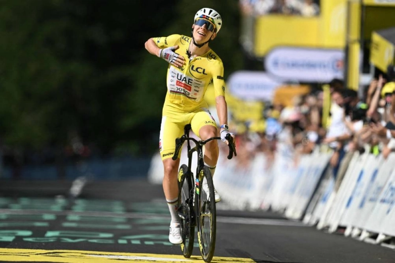 UAE Team Emirates - XRG's Slovenian rider Tadej Pogacar cycles to the finish line to win the 10th stage of the 113th edition of the Tour de France, 166,6 km between Aurillac and Le Lioran in the Massif Central, on July 14, 2026. (AFP) UAE Team Emirates - XRG's Slovenian rider Tadej Pogacar cycles to the finish line to win the 10th stage of the 113th edition of the Tour de France, 166,6 km between Aurillac and Le Lioran in the Massif Central, on July 14, 2026. (AFP)