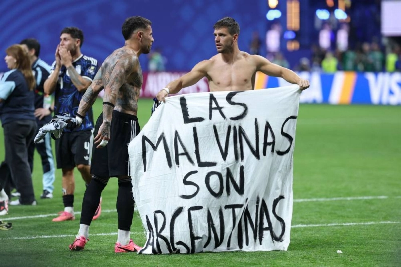 Argentina's players show a banner that reads in Spanish, "The Malvinas (Falkland Islands) belong to Argentina," after winning the 2026 World Cup semi-final against England at the Atlanta Stadium in Atlanta on July 15, 2026. (AFP) Argentina's players show a banner that reads in Spanish, "The Malvinas (Falkland Islands) belong to Argentina," after winning the 2026 World Cup semi-final against England at the Atlanta Stadium in Atlanta on July 15, 2026. (AFP)