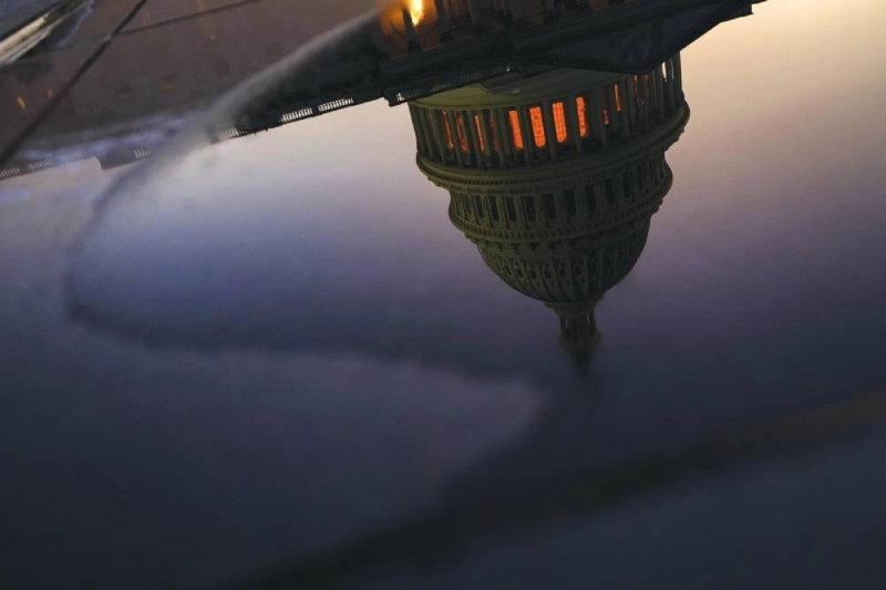 The US Capitol is reflected in water in Washington, DC US. (Reuters)
The US Capitol is reflected in water in Washington, DC US. (Reuters)