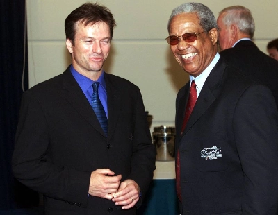 Legendary West Indies captain and all-rounder Sir Garfield Sobers (right) shares a joke with Australian captain Steve Waugh at a function in Brisbane on November 21, 2000, to commemorate the 40th anniversary of the famous tied Test between the two teams. Gary Sobers, arguably the greatest ever cricketer, has died aged 89 West Indies Cricket announced on July 17, 2026. (AFP) Legendary West Indies captain and all-rounder Sir Garfield Sobers (right) shares a joke with Australian captain Steve Waugh at a function in Brisbane on November 21, 2000, to commemorate the 40th anniversary of the famous tied Test between the two teams. Gary Sobers, arguably the greatest ever cricketer, has died aged 89 West Indies Cricket announced on July 17, 2026. (AFP)