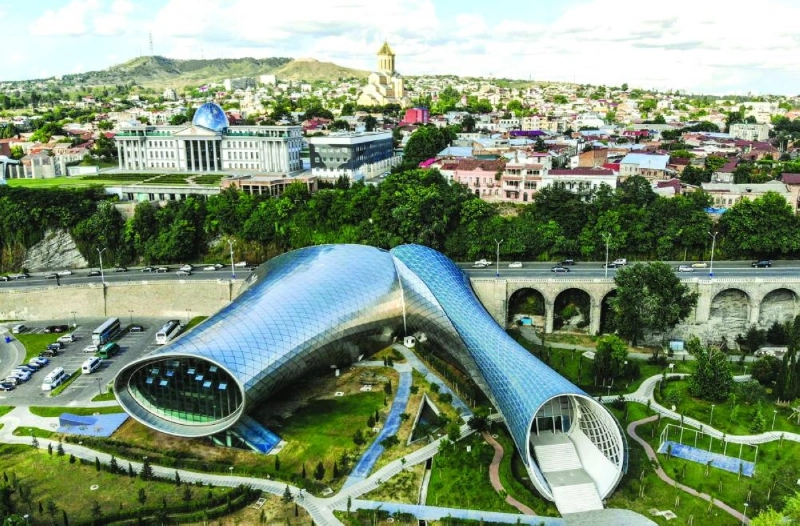 This aerial photograph shows a general view of The Rike Park Theatre and Exhibition Hall (centre) in front of The Presidential Palace in the Georgian capital of Tbilisi. (AFP/File Photo) This aerial photograph shows a general view of The Rike Park Theatre and Exhibition Hall (centre) in front of The Presidential Palace in the Georgian capital of Tbilisi. (AFP/File Photo)