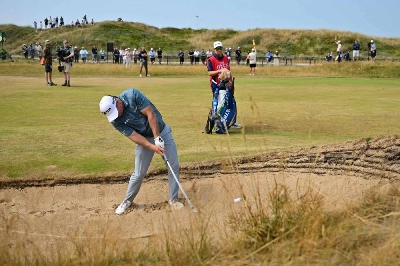 New Zealand's Ryan Fox plays from a bunker on the 18th hole on his way to returning a record Open Championship low score equaling 62 on the 18th green on day three of the 154th Open at Royal Birkdale Golf Club near Southport in north-west England on July 18, 2026. (AFP) New Zealand's Ryan Fox plays from a bunker on the 18th hole on his way to returning a record Open Championship low score equaling 62 on the 18th green on day three of the 154th Open at Royal Birkdale Golf Club near Southport in north-west England on July 18, 2026. (AFP)