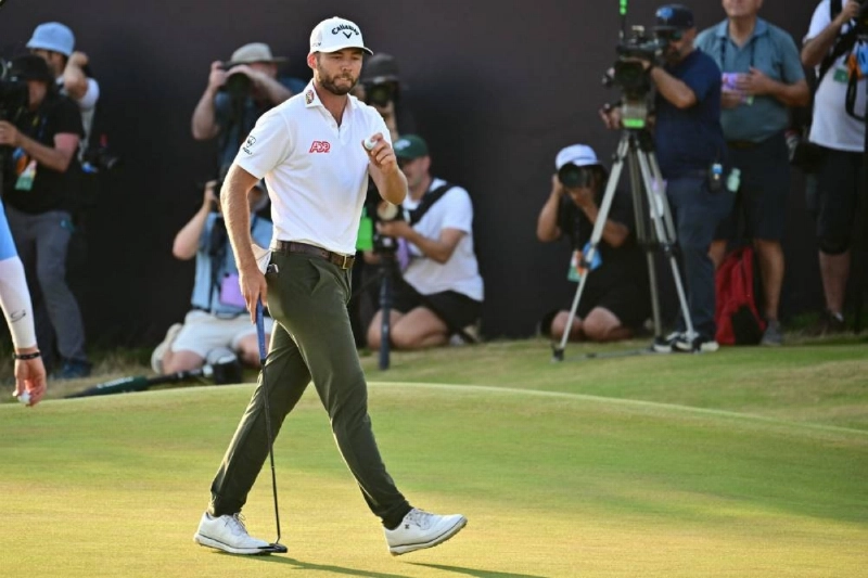 US golfer Sam Burns reacts on the 18th green on day three of the 154th Open at Royal Birkdale Golf Club near Southport in north-west England on July 18, 2026. (AFP) US golfer Sam Burns reacts on the 18th green on day three of the 154th Open at Royal Birkdale Golf Club near Southport in north-west England on July 18, 2026. (AFP)