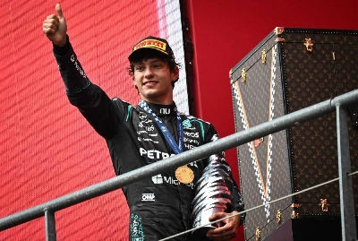 Mercedes' Italian driver Kimi Antonelli celebrates with the trophy during the podium ceremony after winning the Formula One Belgian Grand Prix at the Spa-Francorchamps circuit, in Spa, on July 19, 2026. (AFP) Mercedes' Italian driver Kimi Antonelli celebrates with the trophy during the podium ceremony after winning the Formula One Belgian Grand Prix at the Spa-Francorchamps circuit, in Spa, on July 19, 2026. (AFP)