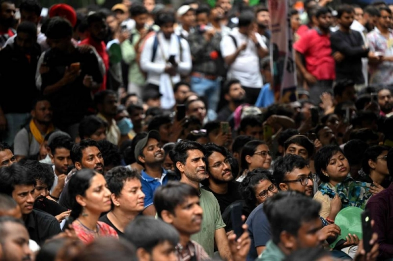 Cockroach Janta Party (CJP) supporters attend a sit-in protest demanding the resignation of India's Education Minister Dharmendra Pradhan over alleged NEET examination irregularities in New Delhi yesterday. (AFP) Cockroach Janta Party (CJP) supporters attend a sit-in protest demanding the resignation of India's Education Minister Dharmendra Pradhan over alleged NEET examination irregularities in New Delhi yesterday. (AFP)