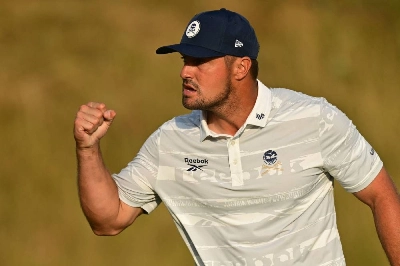 Bryson DeChambeau reacts to making his birdie putt on the 17th green on day three of the 154th Open Golf championship at Royal Birkdale Golf Club near Southport in north-west England on July 18, 2026. (AFP) Bryson DeChambeau reacts to making his birdie putt on the 17th green on day three of the 154th Open Golf championship at Royal Birkdale Golf Club near Southport in north-west England on July 18, 2026. (AFP)
