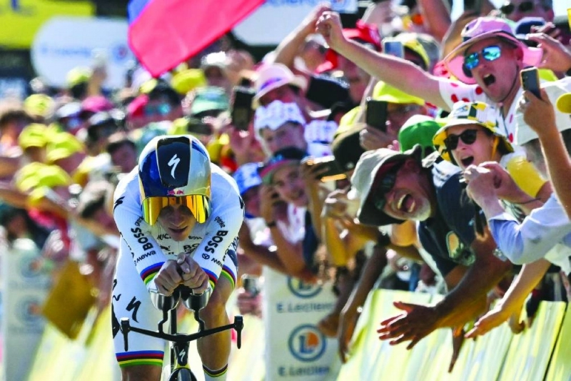 Belgian rider Remco Evenepoel cycles to the finish line of the 16th stage of the 113th edition of the Tour de France, 26 km between Évian-les-Bains and Thonon-les-Bains in the French Alps, on July 21, 2026. (AFP) Belgian rider Remco Evenepoel cycles to the finish line of the 16th stage of the 113th edition of the Tour de France, 26 km between Évian-les-Bains and Thonon-les-Bains in the French Alps, on July 21, 2026. (AFP)