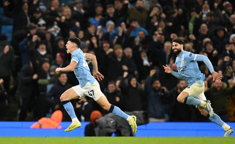 Manchester City's midfielder Phil Foden celebrates scoring his team's third goal during the English Premier League match against Leeds United at the Etihad Stadium in Manchester, north west England, on November 29, 2025. (AFP) Manchester City's midfielder Phil Foden celebrates scoring his team's third goal during the English Premier League match against Leeds United at the Etihad Stadium in Manchester, north west England, on November 29, 2025. (AFP)