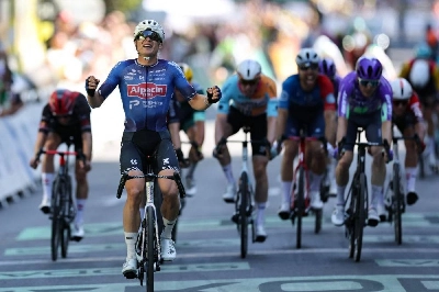 Belgian rider Jasper Philipsen cycles past the finish line to win the 17th stage of the 113th edition of the Tour de France, 174,7 km between Chambéry and Voiron in the French Alps, on July 22, 2026. (AFP) Belgian rider Jasper Philipsen cycles past the finish line to win the 17th stage of the 113th edition of the Tour de France, 174,7 km between Chambéry and Voiron in the French Alps, on July 22, 2026. (AFP)