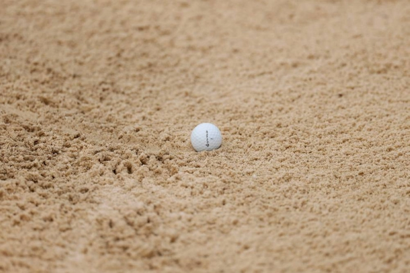 A detailed view of a Taylormade golf ball in a bunker on the first hole during a practice round prior to the 3M Open 2026 at TPC Twin Cities on July 22, 2026 in Blaine, Minnesota.(AFP) A detailed view of a Taylormade golf ball in a bunker on the first hole during a practice round prior to the 3M Open 2026 at TPC Twin Cities on July 22, 2026 in Blaine, Minnesota.(AFP)