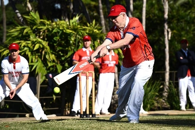 Australian Prime Minister Anthony Albanese plays a shot as he takes part in a charity backyard cricket match at Kirribilli House in Sydney on July 21, 2026. (AFP) Australian Prime Minister Anthony Albanese plays a shot as he takes part in a charity backyard cricket match at Kirribilli House in Sydney on July 21, 2026. (AFP)
