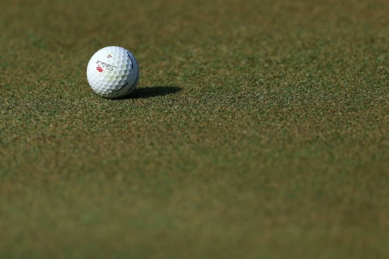 A detail view of a golf ball on the 15th green during the first round of the 3M Open 2026 at TPC Twin Cities on July 23, 2026 in Blaine, Minnesota. (AFP) A detail view of a golf ball on the 15th green during the first round of the 3M Open 2026 at TPC Twin Cities on July 23, 2026 in Blaine, Minnesota. (AFP)