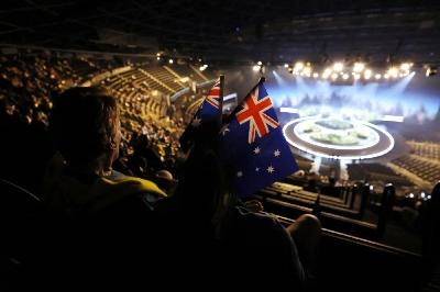 A fans wears the flag of Australia inside the arena before the opening ceremony at the Hydro, Glasgow, Scotland, Britain, on July 23, 2026. (Reuters) A fans wears the flag of Australia inside the arena before the opening ceremony at the Hydro, Glasgow, Scotland, Britain, on July 23, 2026. (Reuters)