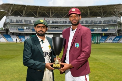 Babar Azam (left) of Pakistan and Roston Chase of West Indies pose with the trophy before the first Test at Brian Lara Cricket Academy in Tarouba, Trinidad and Tobago. (AFP) Babar Azam (left) of Pakistan and Roston Chase of West Indies pose with the trophy before the first Test at Brian Lara Cricket Academy in Tarouba, Trinidad and Tobago. (AFP)