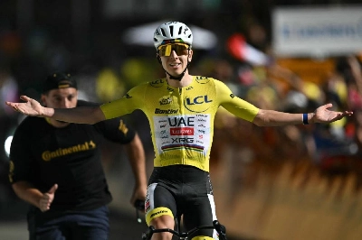 Slovenian rider Tadej Pogacar wearing the overall leader's yellow jersey cycles to the finish line to win the 19th stage of the 113th edition of the Tour de France, 127,9 km between Gap and Alpe d'Huez in the French Alps, on July 24, 2026. (AFP) Slovenian rider Tadej Pogacar wearing the overall leader's yellow jersey cycles to the finish line to win the 19th stage of the 113th edition of the Tour de France, 127,9 km between Gap and Alpe d'Huez in the French Alps, on July 24, 2026. (AFP)