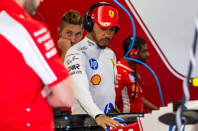 Ferrari's British driver Lewis Hamilton inspects his car during the first practice session at the Hungaroring racetrack in Mogyorod near Budapest, Hungary, on July 24, 2026 ahead of the Hungarian Grand Prix. (AFP) Ferrari's British driver Lewis Hamilton inspects his car during the first practice session at the Hungaroring racetrack in Mogyorod near Budapest, Hungary, on July 24, 2026 ahead of the Hungarian Grand Prix. (AFP)