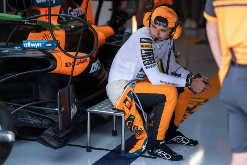McLaren's British driver Lando Norris prepares to enter his car during the first practice session at the Hungaroring racetrack in Budapest on July 24, 2026 ahead of the Hungarian Grand Prix. (AFP) McLaren's British driver Lando Norris prepares to enter his car during the first practice session at the Hungaroring racetrack in Budapest on July 24, 2026 ahead of the Hungarian Grand Prix. (AFP)