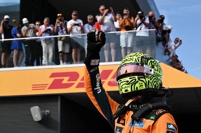 McLaren's British driver Lando Norris celebrates winning the pole position after the qualifying session at the Hungaroring racetrack in Mogyorod near Budapest, Hungary, on July 25, 2026 ahead of the Formula One Hungarian Grand Prix. ( AFP) McLaren's British driver Lando Norris celebrates winning the pole position after the qualifying session at the Hungaroring racetrack in Mogyorod near Budapest, Hungary, on July 25, 2026 ahead of the Formula One Hungarian Grand Prix. ( AFP)