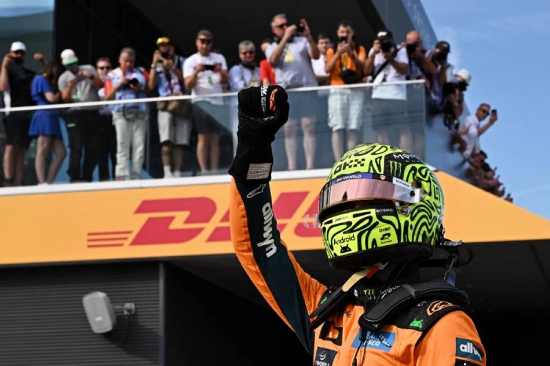 McLaren's British driver Lando Norris celebrates winning the pole position after the qualifying session at the Hungaroring racetrack in Mogyorod near Budapest, Hungary, on July 25, 2026 ahead of the Formula One Hungarian Grand Prix. ( AFP) McLaren's British driver Lando Norris celebrates winning the pole position after the qualifying session at the Hungaroring racetrack in Mogyorod near Budapest, Hungary, on July 25, 2026 ahead of the Formula One Hungarian Grand Prix. ( AFP)