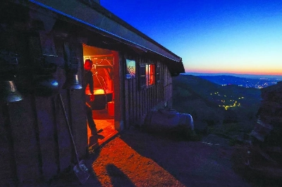 Traditional Gruyere cheese producer Alexandre Murith walks to collect firewood at sunrise on the Tsermon mountain pasture, as Switzerland faces new 12.5% US tariffs imposed by the Trump administration, in Moleson-sur-Gruyeres, Switzerland, July 24, 2026. REUTERS Traditional Gruyere cheese producer Alexandre Murith walks to collect firewood at sunrise on the Tsermon mountain pasture, as Switzerland faces new 12.5% US tariffs imposed by the Trump administration, in Moleson-sur-Gruyeres, Switzerland, July 24, 2026. REUTERS