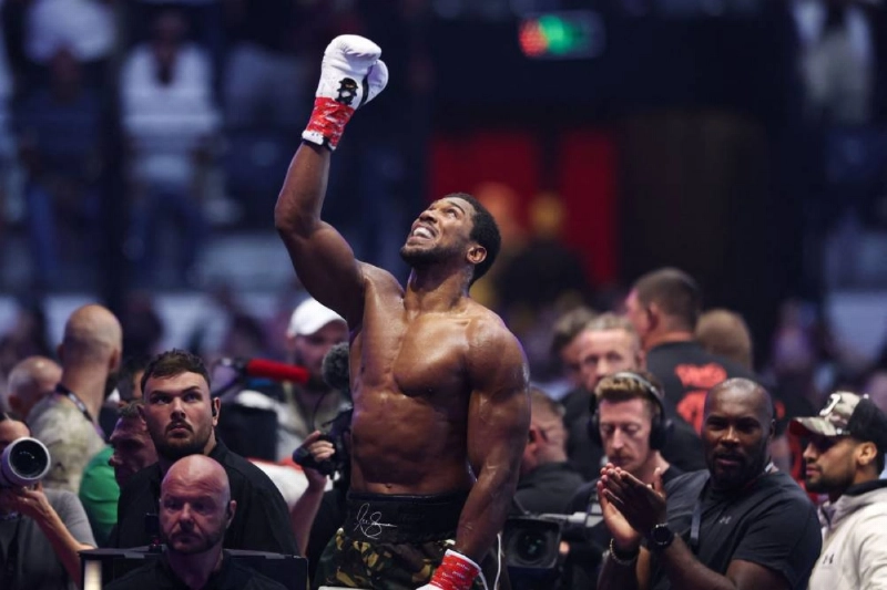 Britain's boxer Anthony Joshua celebrates winning against Albania's boxer Kristian Prenga in their heavyweight fight at the Jeddah Superdome in Jeddah on July 26, 2026. Two-time heavyweight world champion Joshua survived two early knockdowns on the way to a second-round knockout of Prenga, his triumphant ring return paving the way for a blockbuster all-British bout with Tyson Fury. (AFP) Britain's boxer Anthony Joshua celebrates winning against Albania's boxer Kristian Prenga in their heavyweight fight at the Jeddah Superdome in Jeddah on July 26, 2026. Two-time heavyweight world champion Joshua survived two early knockdowns on the way to a second-round knockout of Prenga, his triumphant ring return paving the way for a blockbuster all-British bout with Tyson Fury. (AFP)