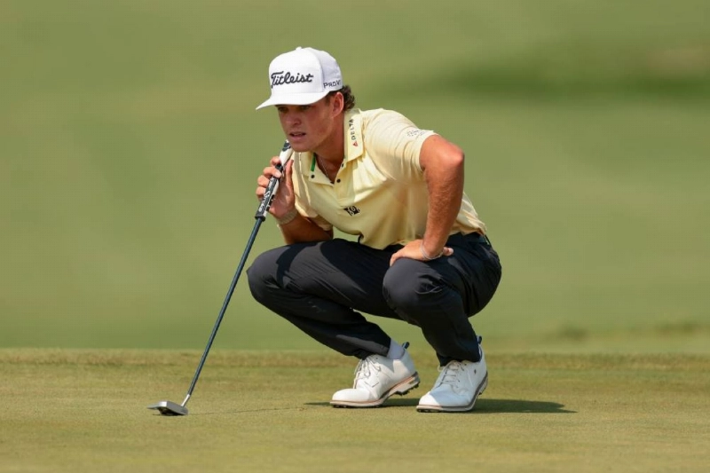 Jackson Koivun of the United States lines up a putt on the 16th green during the third round of the 3M Open 2026 at TPC Twin Cities on July 25, 2026 in Blaine, Minnesota. (AFP) Jackson Koivun of the United States lines up a putt on the 16th green during the third round of the 3M Open 2026 at TPC Twin Cities on July 25, 2026 in Blaine, Minnesota. (AFP)