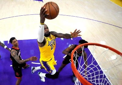 Los Angeles Lakers forward LeBron James (23) shoots the ball against Houston Rockets forward Jabari Smith Jr. (10) and guard Amen Thompson (1) in the second half during game one of the first round of the 2026 NBA Playoffs at Crypto.com Arena on April 18, 2026. (AFP) Los Angeles Lakers forward LeBron James (23) shoots the ball against Houston Rockets forward Jabari Smith Jr. (10) and guard Amen Thompson (1) in the second half during game one of the first round of the 2026 NBA Playoffs at Crypto.com Arena on April 18, 2026. (AFP)