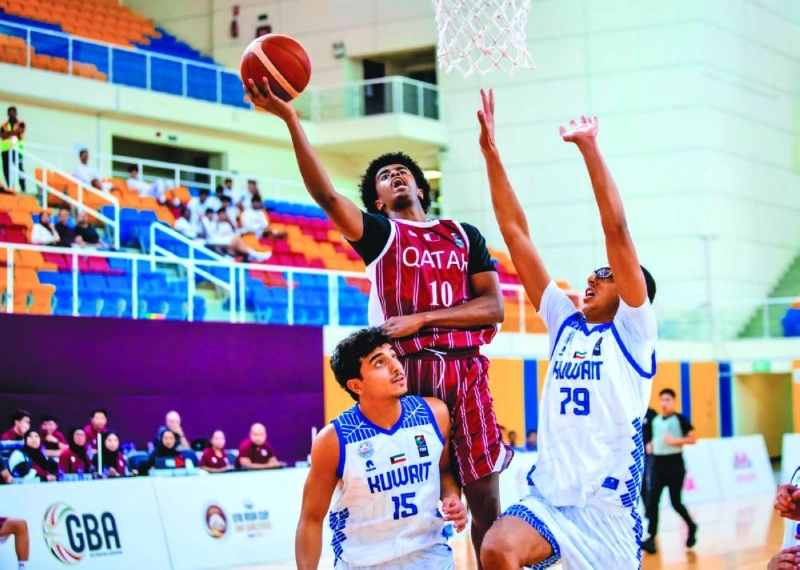 Action from Qatar-Kuwait FIBA U-18 Asia Cup Gulf Qualifiers match held at the Al Gharafa Indoor Hall on Monday. Action from Qatar-Kuwait FIBA U-18 Asia Cup Gulf Qualifiers match held at the Al Gharafa Indoor Hall on Monday.