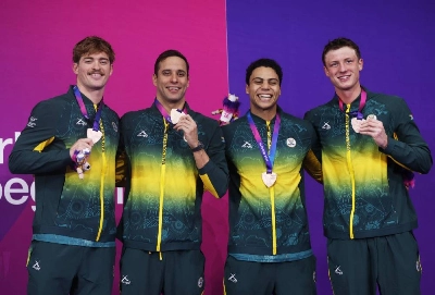 Bronze medallists South Africa's Pieter Coetze, Michael Houlie, Chad le Clos and Ruard van Renen celebrate on the podium after the men's 4 x 100m medley relay final at the Commonwealth Games 2026 in Tollcross International Swimming Centre, Glasgow, Scotland, Britain. (Reuters) Bronze medallists South Africa's Pieter Coetze, Michael Houlie, Chad le Clos and Ruard van Renen celebrate on the podium after the men's 4 x 100m medley relay final at the Commonwealth Games 2026 in Tollcross International Swimming Centre, Glasgow, Scotland, Britain. (Reuters)