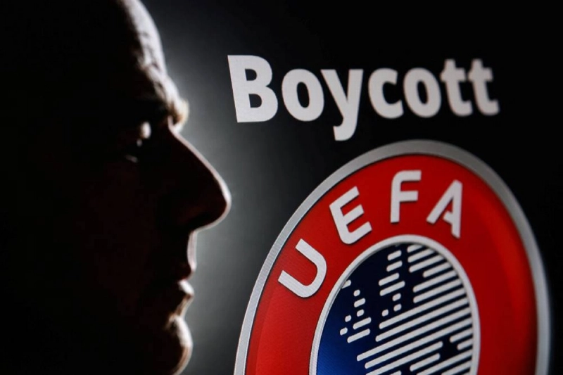 A silhouette depicting FIFA President Gianni Infantino is seen next to a UEFA logo and text reading "Boycott" in this illustration taken July 30, 2026. (Reuters) A silhouette depicting FIFA President Gianni Infantino is seen next to a UEFA logo and text reading "Boycott" in this illustration taken July 30, 2026. (Reuters)