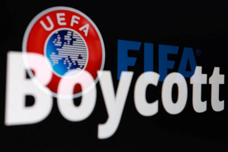 UEFA and FIFA logos are seen next to text reading "Boycott" in this illustration taken July 30, 2026. (Reuters) UEFA and FIFA logos are seen next to text reading "Boycott" in this illustration taken July 30, 2026. (Reuters)
