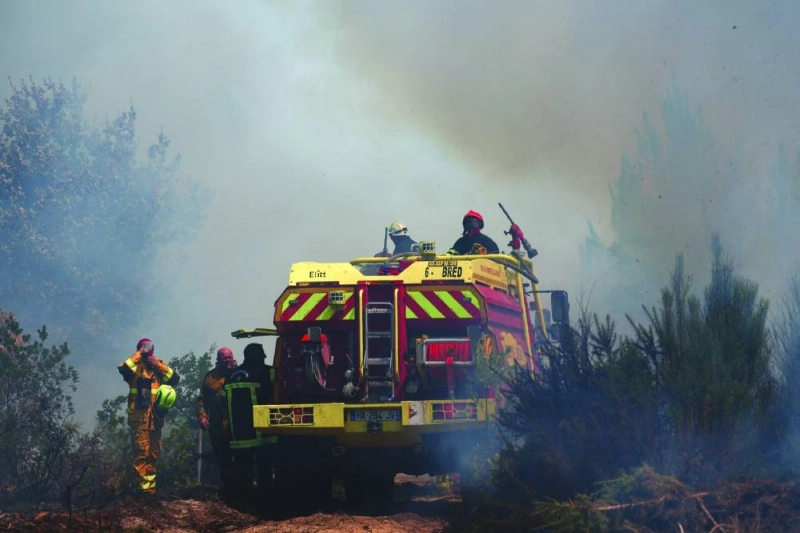 Firefighters stand by a fire engine, while taking part in a tactical fire in Lege-Cap-Ferret, Gironde department, amid drought conditions following a heatwave and water shortages across much of France, July 31, 2026. REUTERS/Florion Goga Firefighters stand by a fire engine, while taking part in a tactical fire in Lege-Cap-Ferret, Gironde department, amid drought conditions following a heatwave and water shortages across much of France, July 31, 2026. REUTERS/Florion Goga