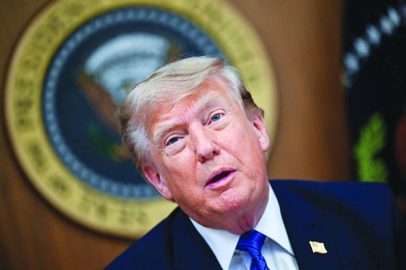 US President Donald Trump participates in a cabinet meeting at Camp David in Thurmont, Maryland, US, yesterday. (Reuters)
US President Donald Trump participates in a cabinet meeting at Camp David in Thurmont, Maryland, US, yesterday. (Reuters)