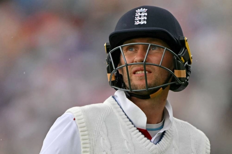 England's Joe Root looks to the sky as rain stops play on the second day of the second Test against New Zealand at The Oval in London on June 18, 2026. (AFP) England's Joe Root looks to the sky as rain stops play on the second day of the second Test against New Zealand at The Oval in London on June 18, 2026. (AFP)