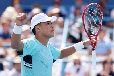 Brandon Nakashima of the United States celebrates after winning against Alex de Minaur of Australia on day five of the Mubadala DC Open in Washington, DC, on July 31. (AFP) Brandon Nakashima of the United States celebrates after winning against Alex de Minaur of Australia on day five of the Mubadala DC Open in Washington, DC, on July 31. (AFP)