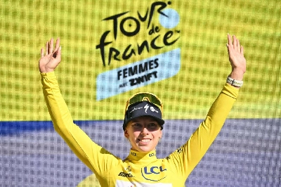 Team SD Worx-Protime's Dutch rider Lorena Wiebes wearing the overall leader's yellow jersey celebrates on the podium after winning the second stage of the fifth edition of the Women's Tour de France, 147.9 km from Aigle to Geneva, in Geneva on August 2, 2026. (AFP) Team SD Worx-Protime's Dutch rider Lorena Wiebes wearing the overall leader's yellow jersey celebrates on the podium after winning the second stage of the fifth edition of the Women's Tour de France, 147.9 km from Aigle to Geneva, in Geneva on August 2, 2026. (AFP)