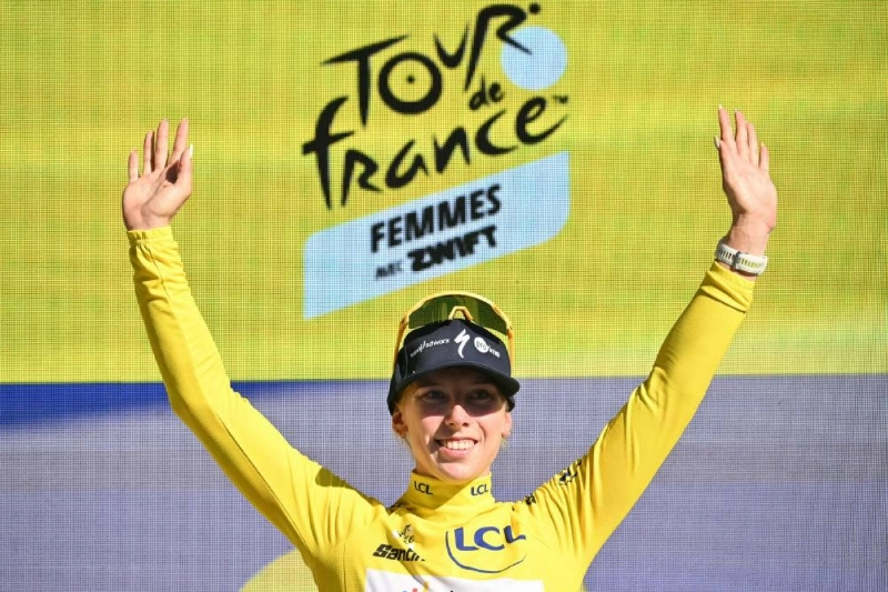 Team SD Worx-Protime's Dutch rider Lorena Wiebes wearing the overall leader's yellow jersey celebrates on the podium after winning the second stage of the fifth edition of the Women's Tour de France, 147.9 km from Aigle to Geneva, in Geneva on August 2, 2026. (AFP) Team SD Worx-Protime's Dutch rider Lorena Wiebes wearing the overall leader's yellow jersey celebrates on the podium after winning the second stage of the fifth edition of the Women's Tour de France, 147.9 km from Aigle to Geneva, in Geneva on August 2, 2026. (AFP)