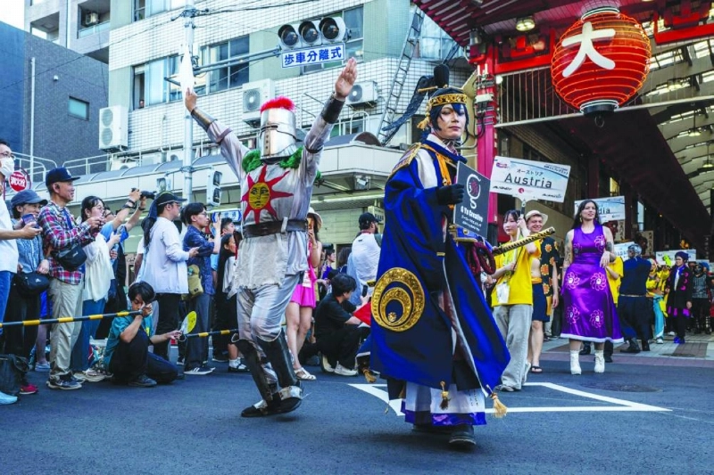 Cosplayers take part in the Osu Cosplay Parade, during the second day of the World Cosplay Summit 2026 in Nagoya on Saturday. (AFP) Cosplayers take part in the Osu Cosplay Parade, during the second day of the World Cosplay Summit 2026 in Nagoya on Saturday. (AFP)
