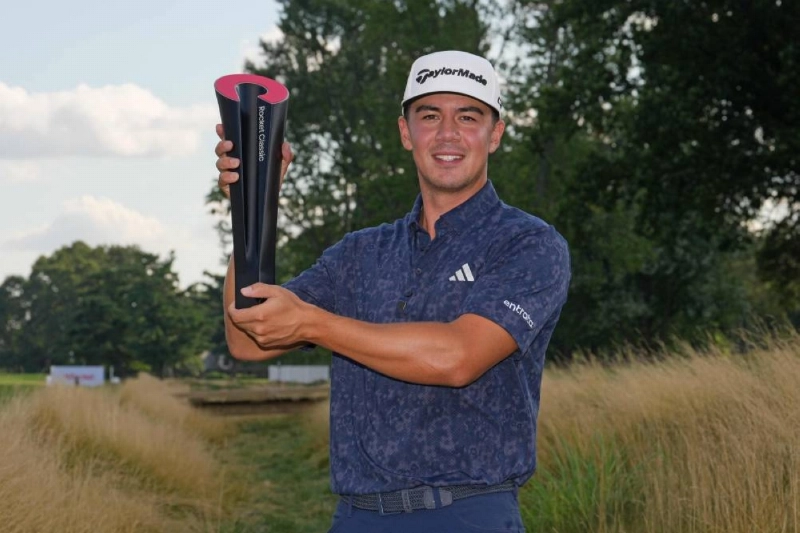 Michael Thorbjornsen of the United States poses with the trophy after winning the Rocket Classic at Detroit Golf Club in Detroit on August 2, 2026. (AFP) Michael Thorbjornsen of the United States poses with the trophy after winning the Rocket Classic at Detroit Golf Club in Detroit on August 2, 2026. (AFP)