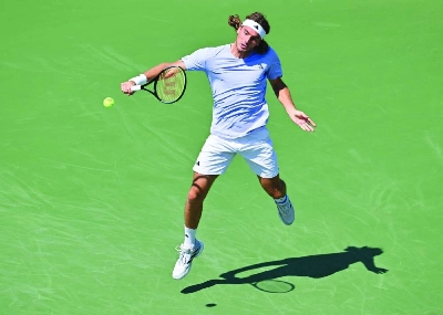 Stefanos Tsitsipas of Greece plays a backhand against Martin Damm of the United States during the Montreal Masters on Tuesday. (Reuters) Stefanos Tsitsipas of Greece plays a backhand against Martin Damm of the United States during the Montreal Masters on Tuesday. (Reuters)