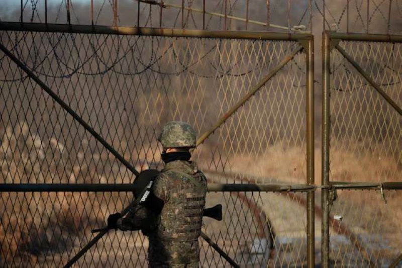 A Korean soldier stands guard next to the rails which leads to North Korea, inside the demilitarised zone separating the two Koreas in Paju, Korea. (Reuters/File Photo) A Korean soldier stands guard next to the rails which leads to North Korea, inside the demilitarised zone separating the two Koreas in Paju, Korea. (Reuters/File Photo)