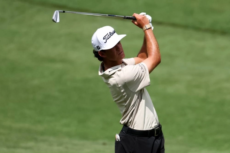 Jackson Koivun of the United States plays his shot from the eleventh fairway during the Pro Am prior to the Wyndham Championship 2026 at Sedgefield Country Club in Greensboro, North Carolina. (AFP) Jackson Koivun of the United States plays his shot from the eleventh fairway during the Pro Am prior to the Wyndham Championship 2026 at Sedgefield Country Club in Greensboro, North Carolina. (AFP)